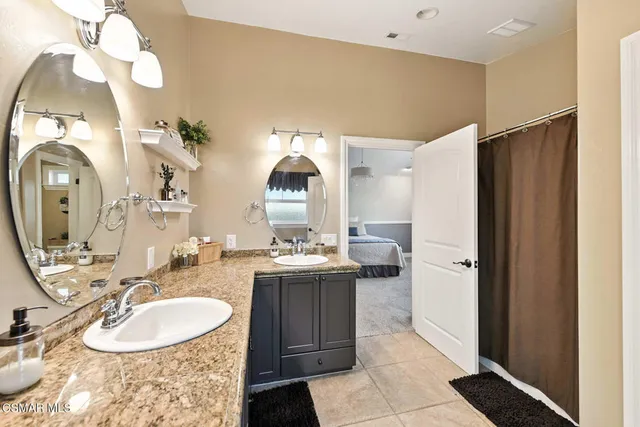 a house view with a sitting space and garden