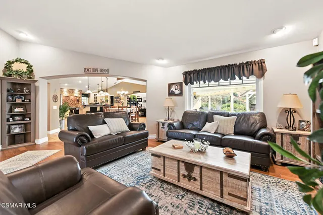 a living room with furniture and a couch