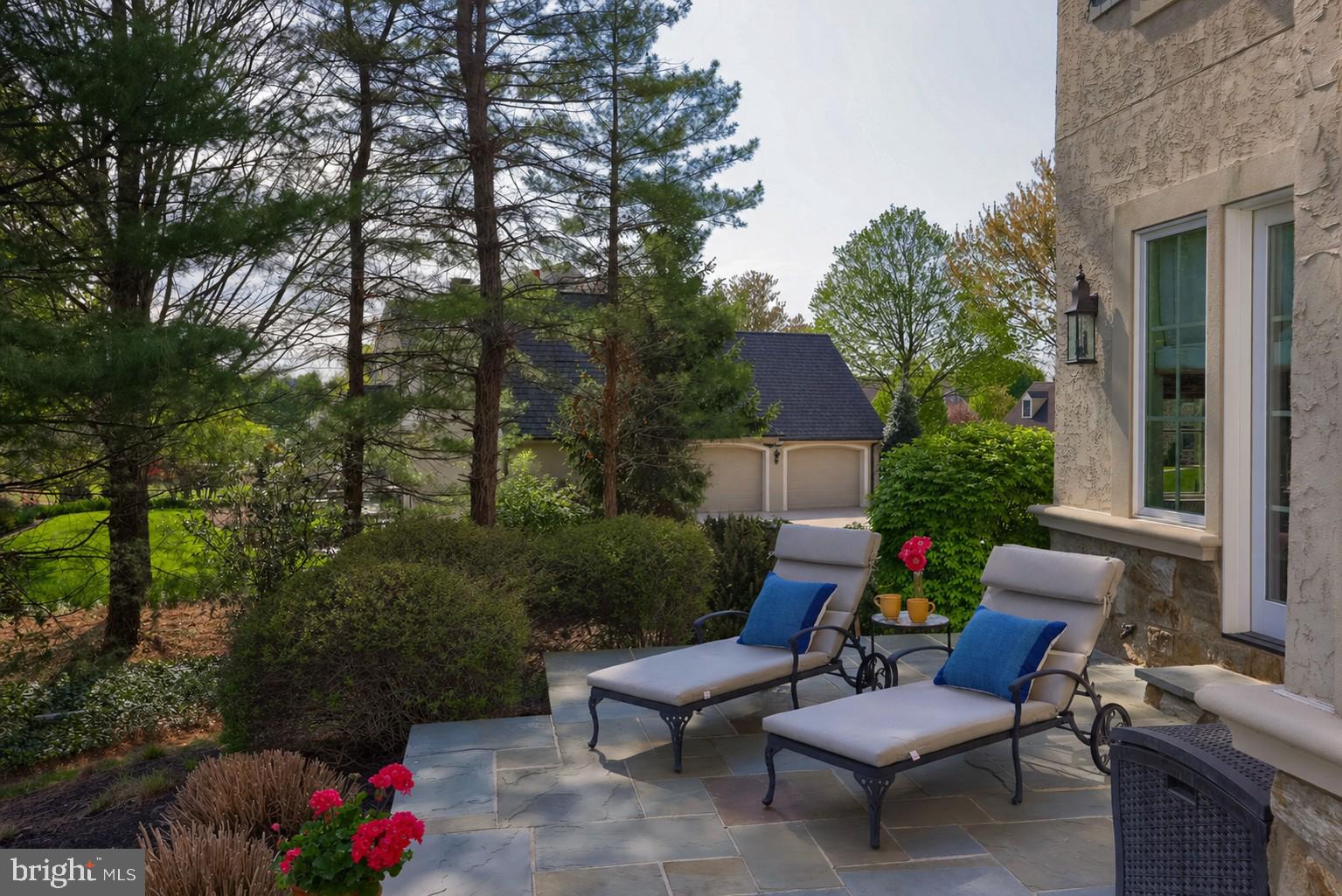 905 Greenside Drive Lititz, PA 17543 - Photo 110 of 127 a view of a patio with couches table and chairs and potted plants