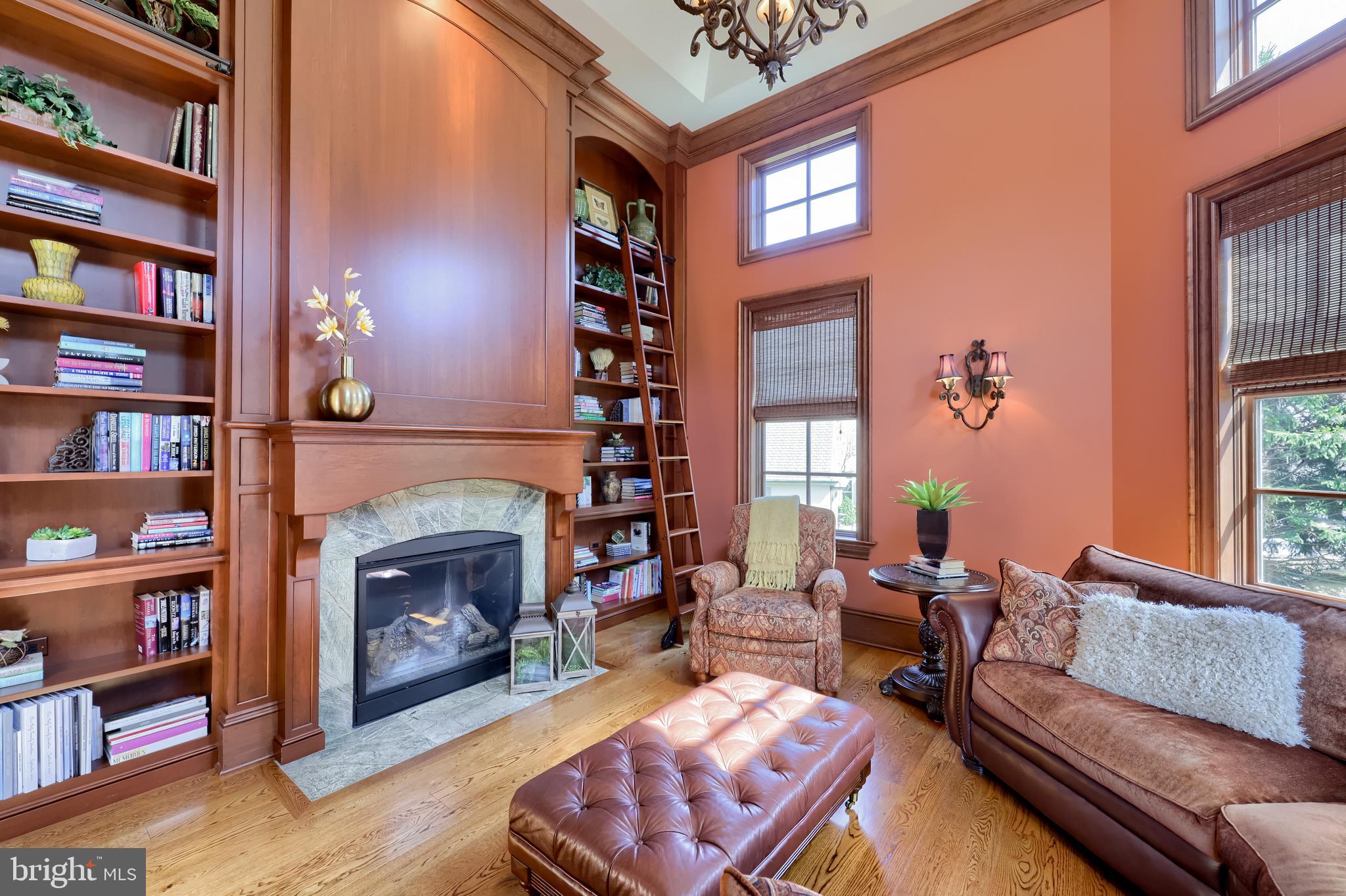 905 Greenside Drive Lititz, PA 17543 - Photo 13 of 127 a living room with furniture and a fireplace