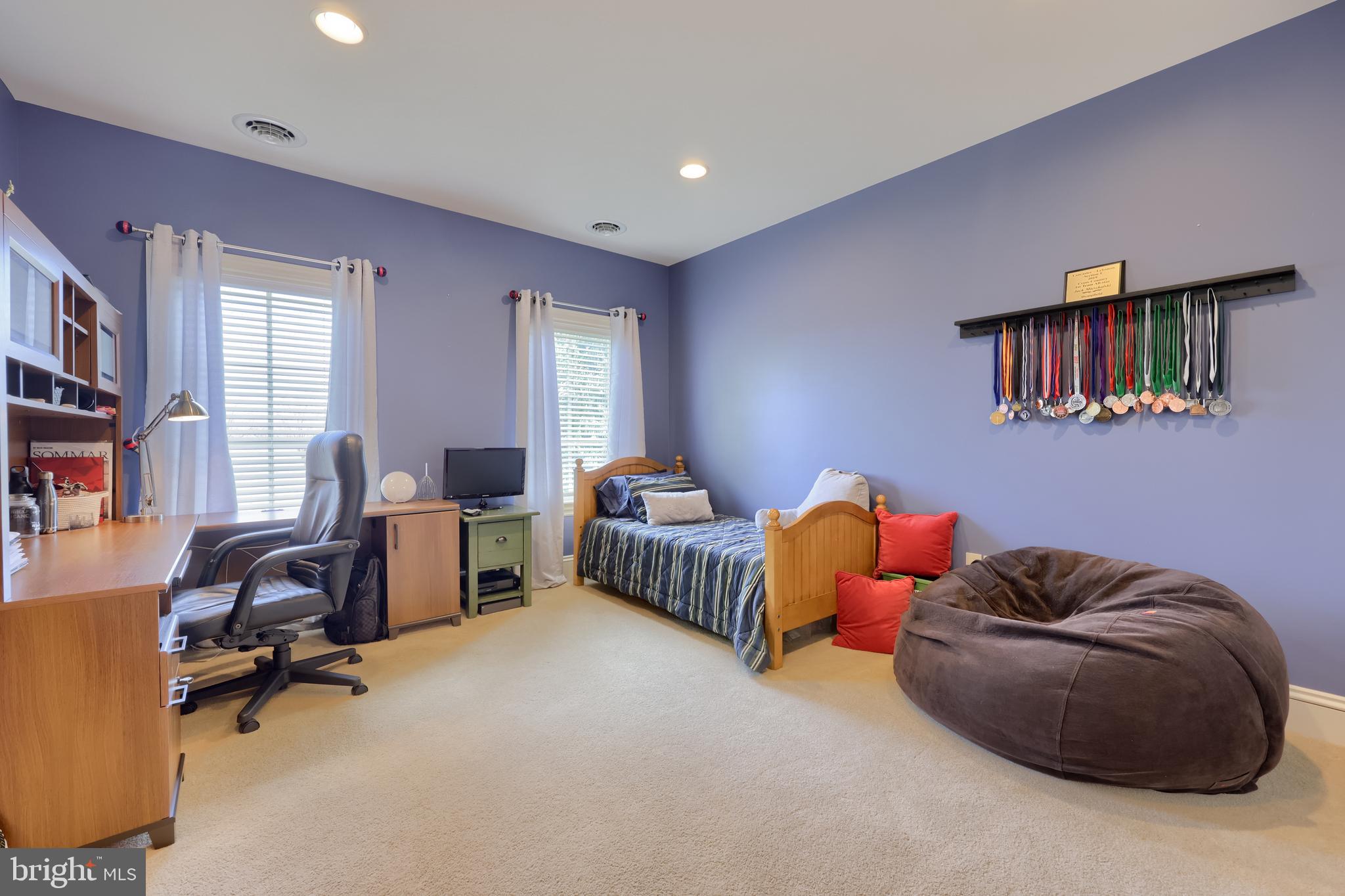 905 Greenside Drive Lititz, PA 17543 - Photo 72 of 127 a livingroom with workspace and a couch