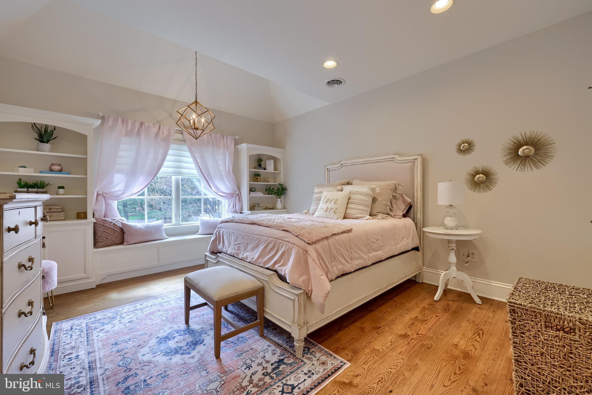 905 Greenside Drive Lititz, PA 17543 - Photo 74 of 127 a bedroom with a bed and a chandelier