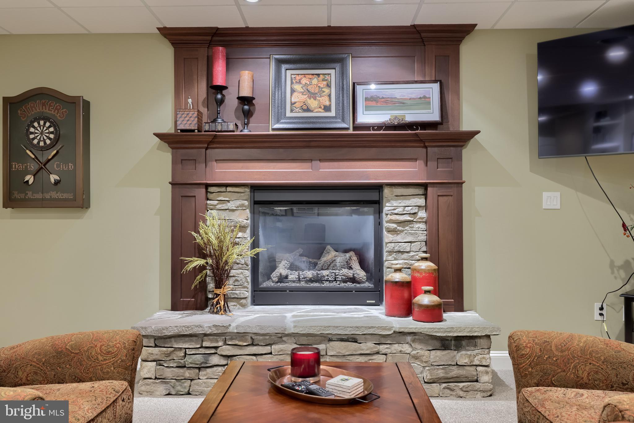 905 Greenside Drive Lititz, PA 17543 - Photo 82 of 127 a living room with furniture and a fireplace