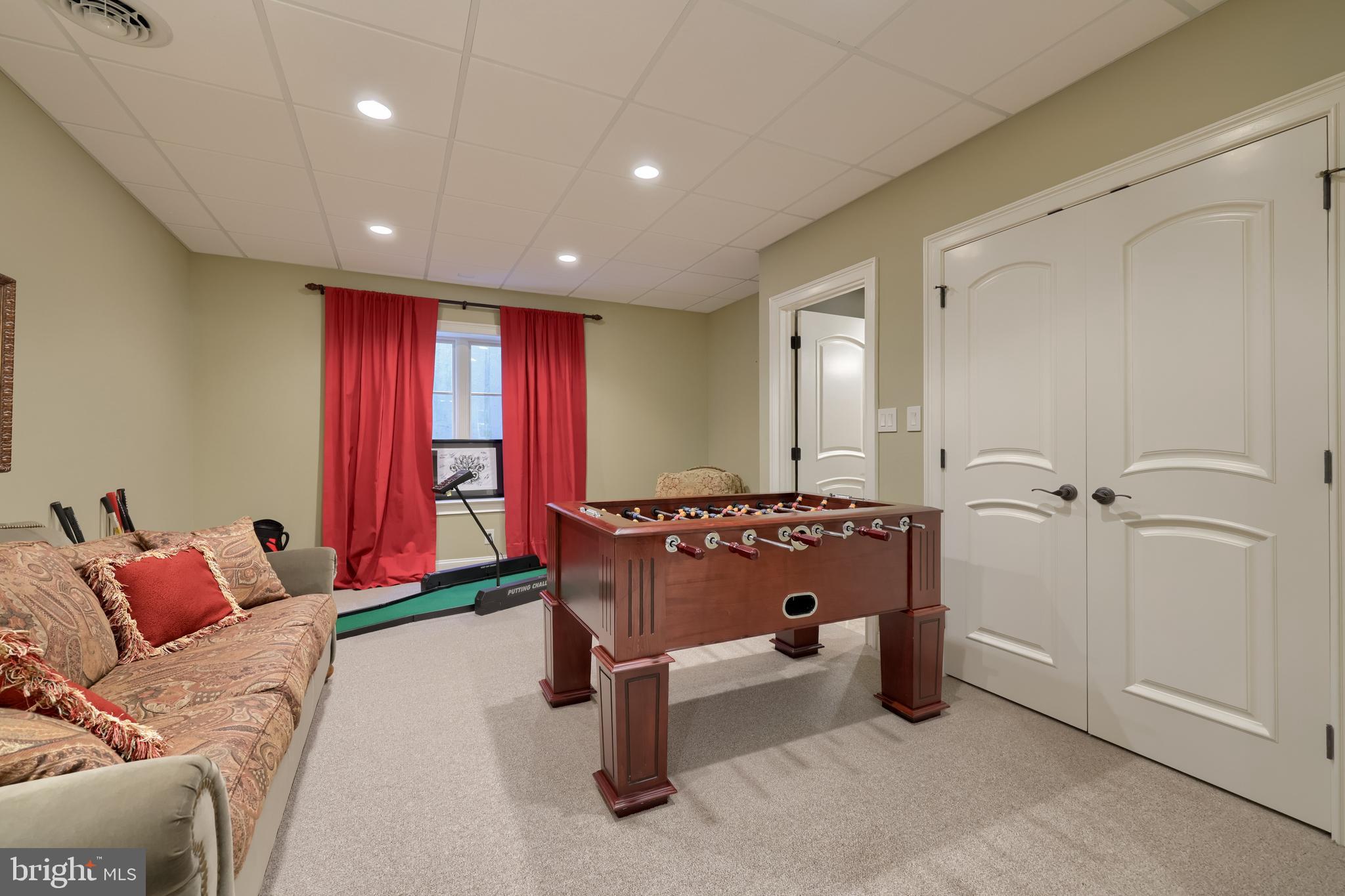 905 Greenside Drive Lititz, PA 17543 - Photo 88 of 127 a spacious bedroom with a bed and a couch