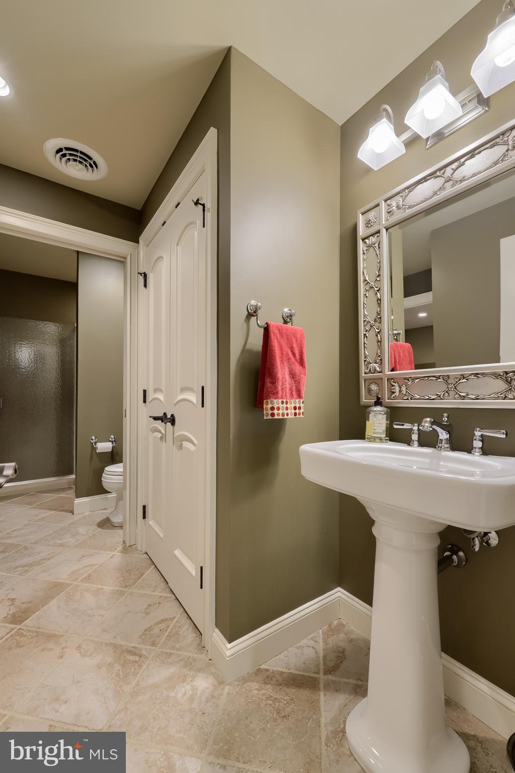 905 Greenside Drive Lititz, PA 17543 - Photo 95 of 127 a bathroom with a sink vanity mirror and toilet