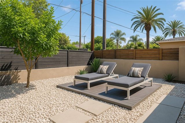 a view of a roof deck with couches and wooden floor