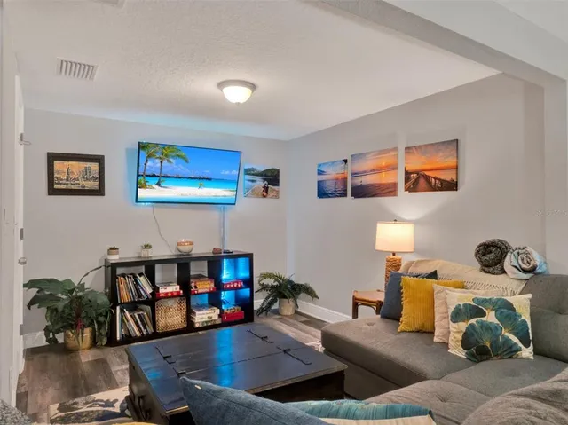 a living room with furniture and a couch