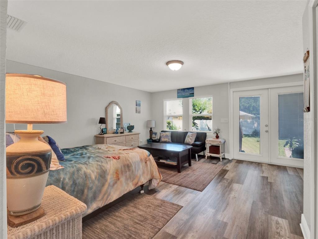 2721 Evergreen Drive Edgewater, FL 32141 - Photo 23 of 29 a bed room with a bed and a window