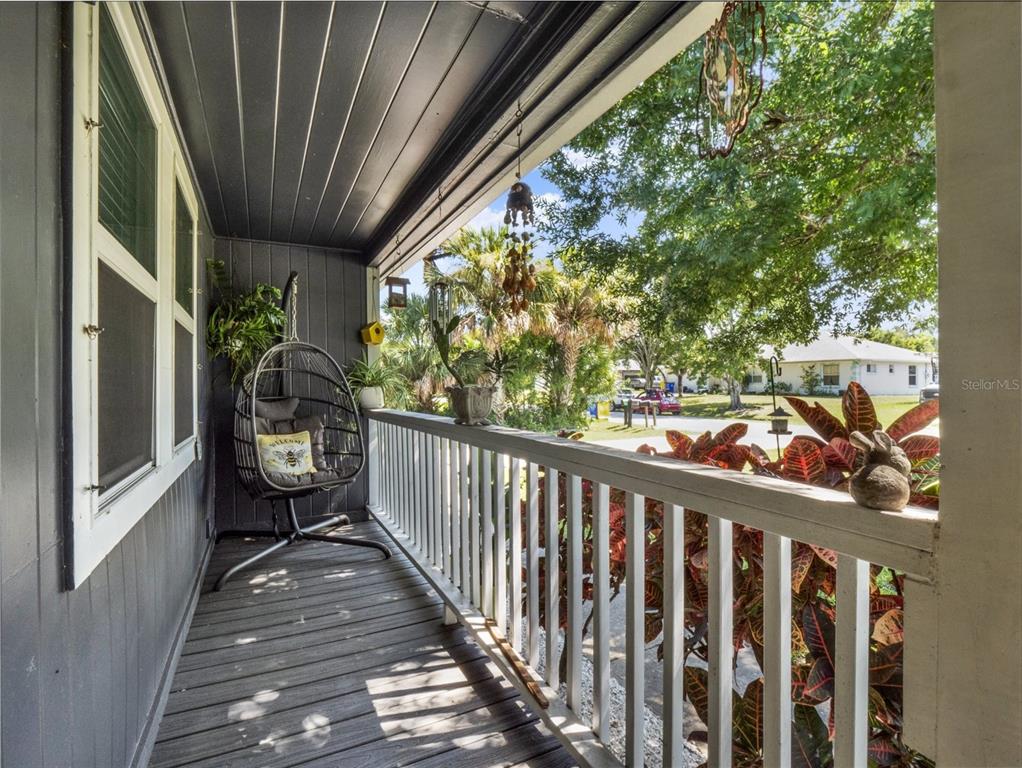 2721 Evergreen Drive Edgewater, FL 32141 - Photo 5 of 29 a view of a balcony with chairs