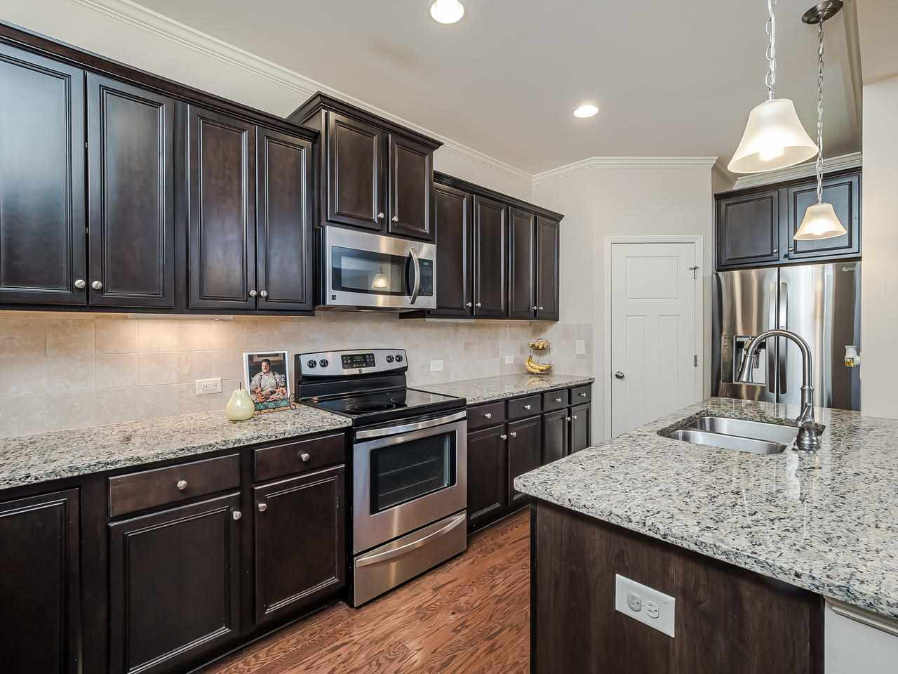 1008 Ranchester Road Knightdale, NC 27545 - Photo 13 of 29 Cabinet space for DAYS with a walk in pantry.