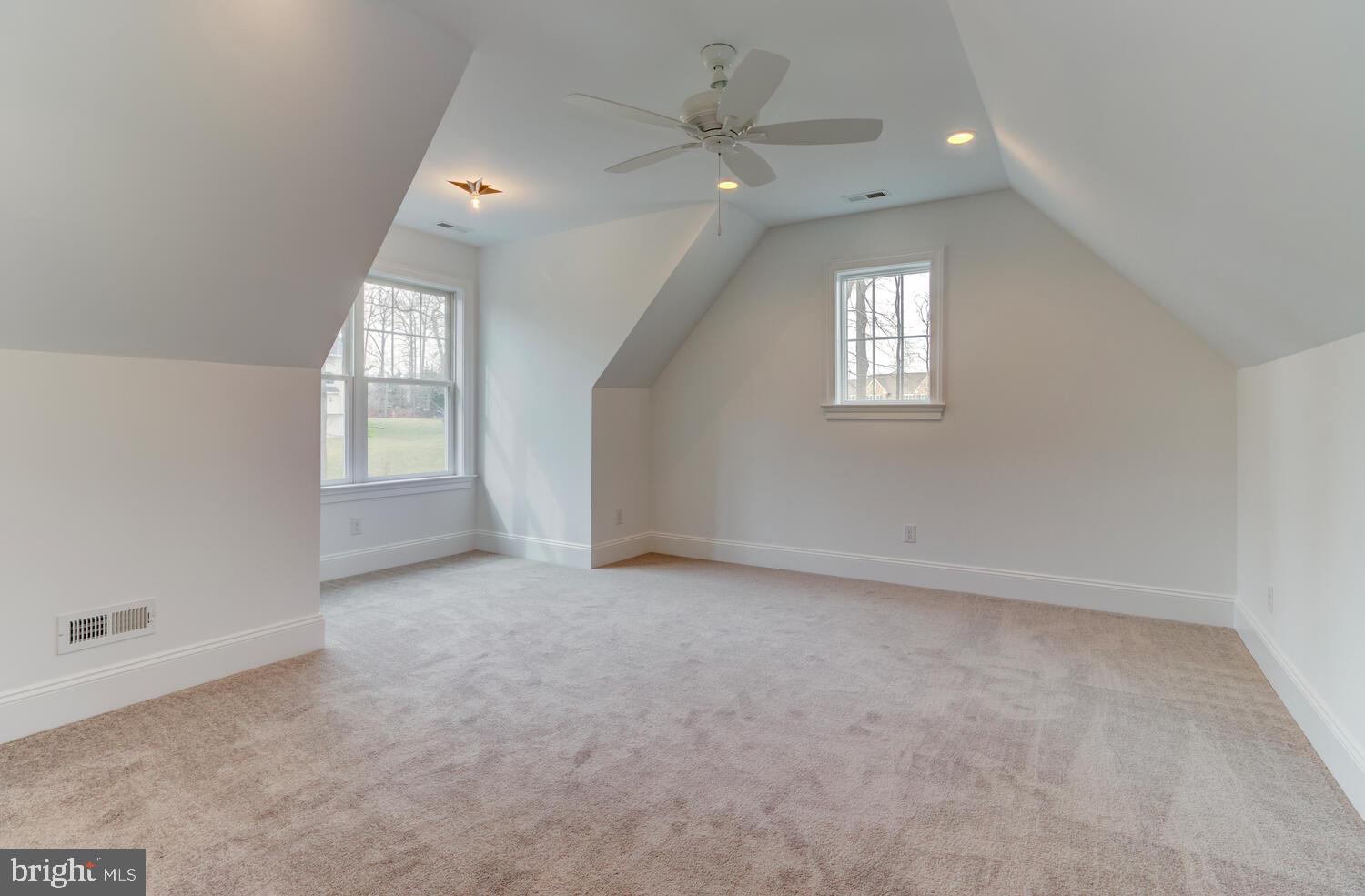 5 Rose Glenn Devon, PA 19333 - Photo 13 of 40 an empty room with windows and ceiling fan
