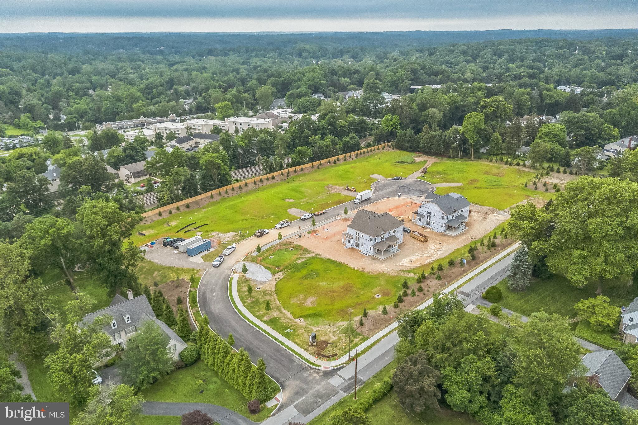 5 Rose Glenn Devon, PA 19333 - Photo 21 of 40 an aerial view of residential houses with outdoor space and swimming pool