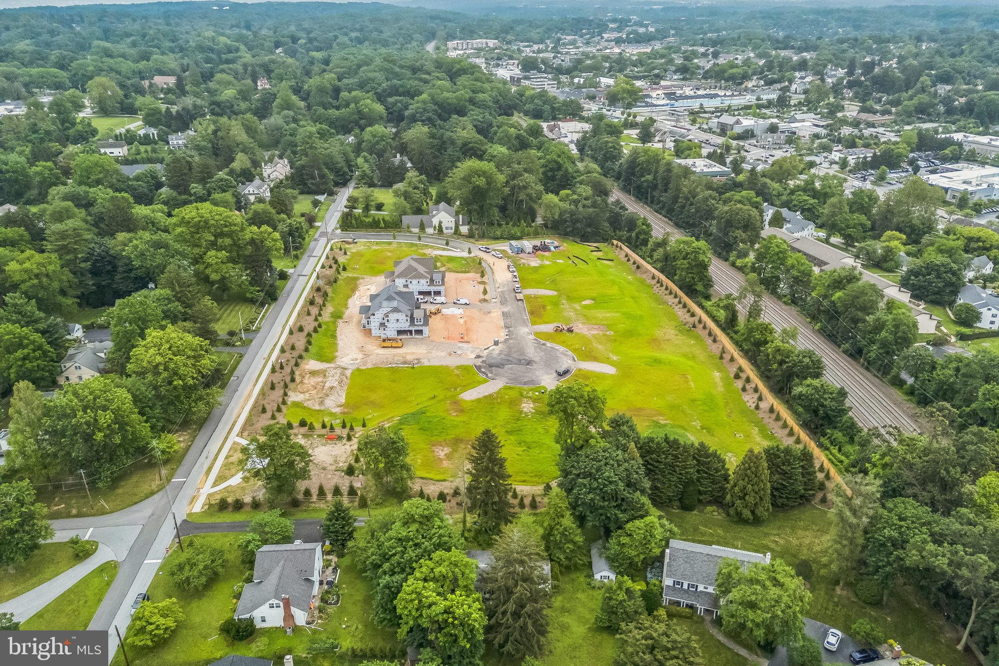 5 Rose Glenn Devon, PA 19333 - Photo 24 of 40 an aerial view of residential houses with outdoor space and swimming pool