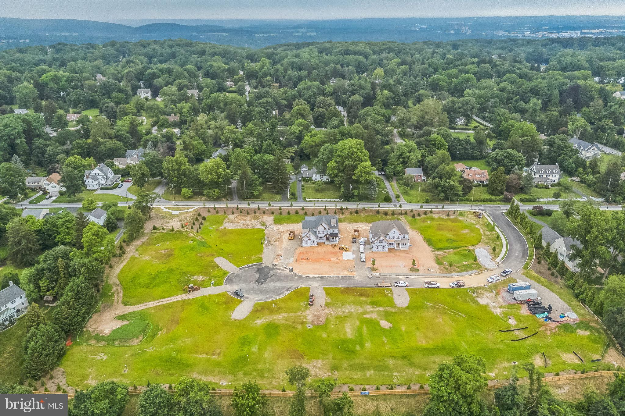 5 Rose Glenn Devon, PA 19333 - Photo 25 of 40 an aerial view of a swimming pool with a yard