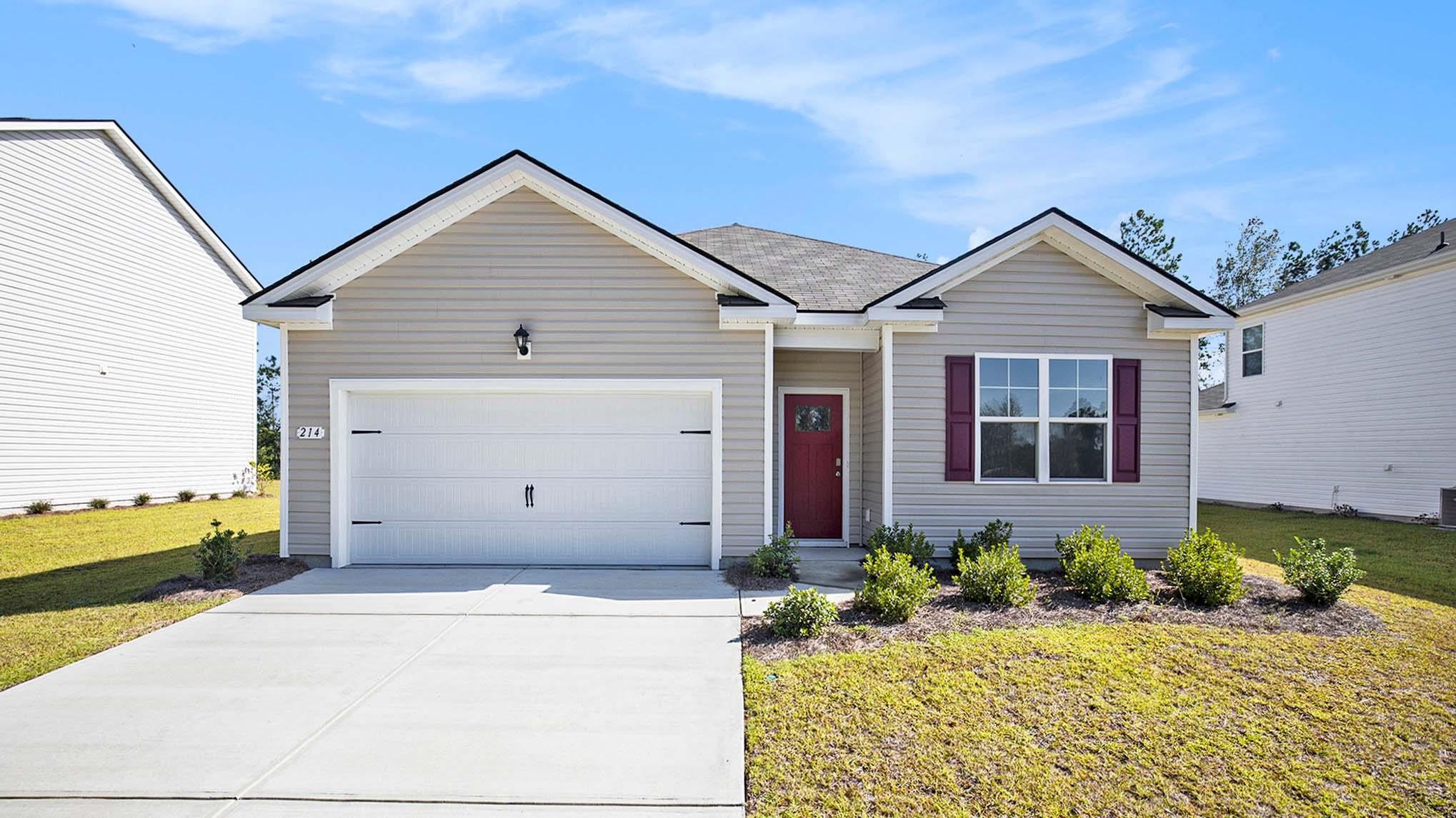 Ranch-style house with concrete driveway, an attached garage, a front yard, and a shingled roof