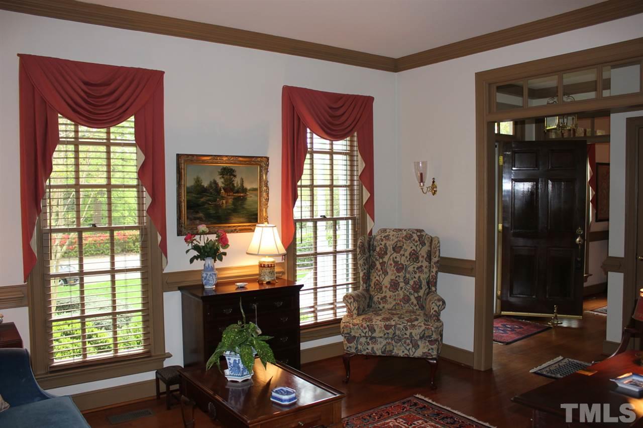 3308 Churchill Road Raleigh, NC 27607 - Photo 2 of 25 a room with furniture and a window