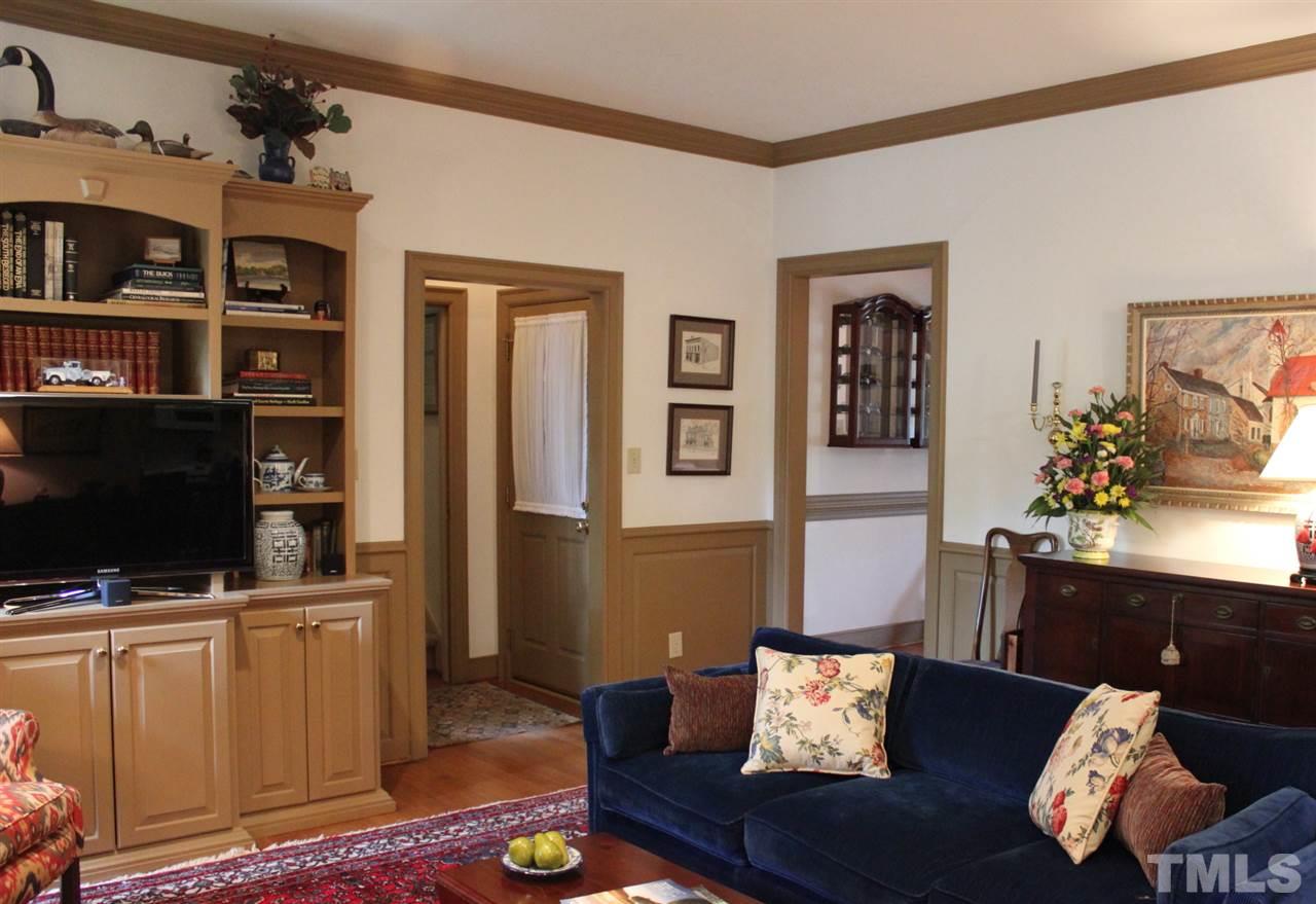 3308 Churchill Road Raleigh, NC 27607 - Photo 11 of 25 a living room with furniture and a flat screen tv