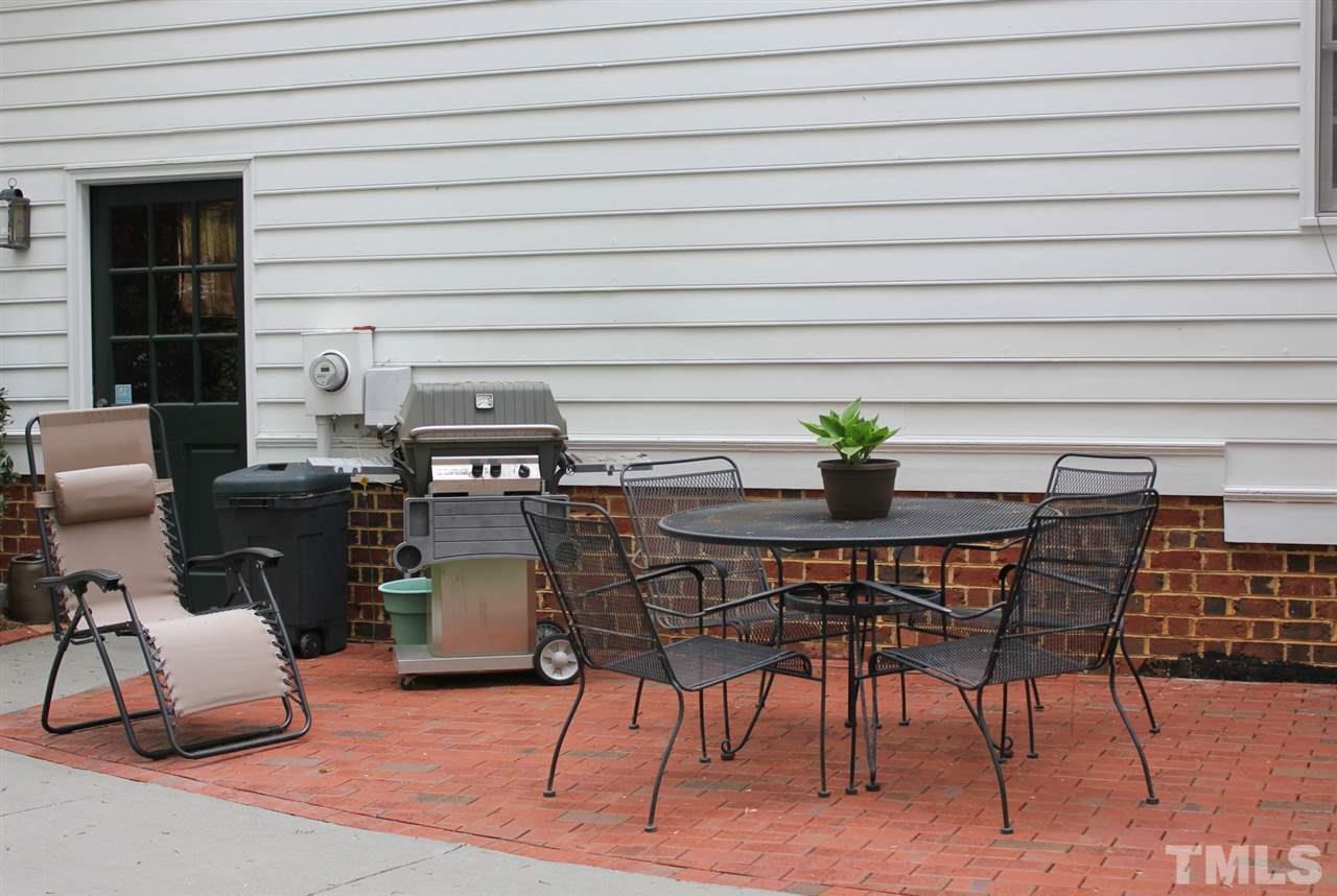 3308 Churchill Road Raleigh, NC 27607 - Photo 22 of 25 a dining room with furniture and wooden floor