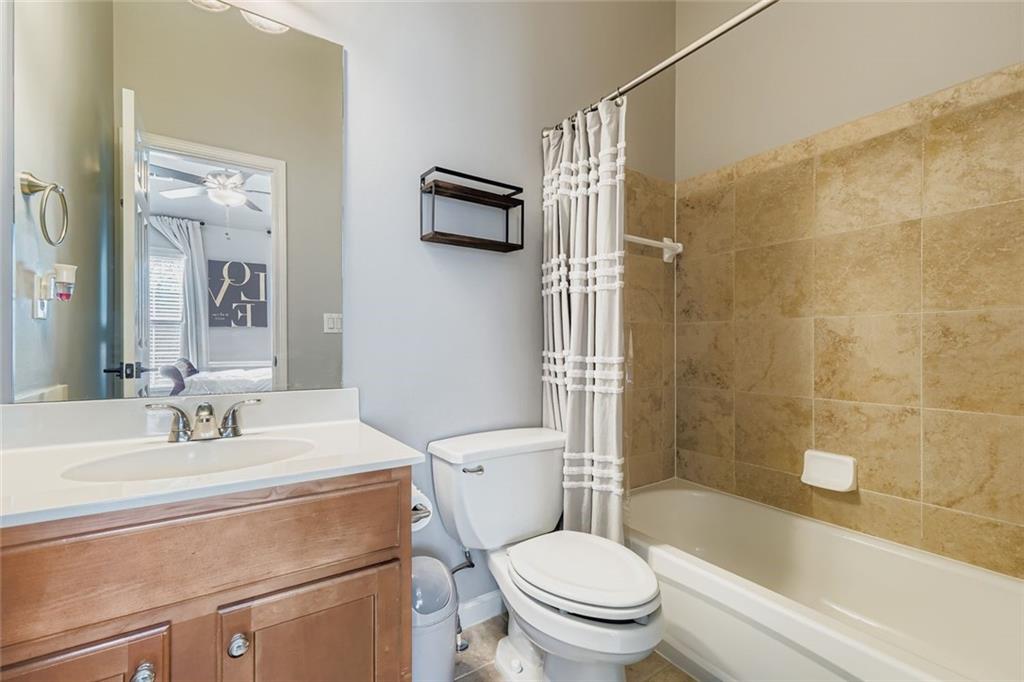 6414 Queens Court Trace, Unit 7 Mableton, GA 30126 - Photo 21 of 28 a bathroom with a sink toilet and shower