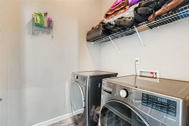 a utility room with dryer and washer