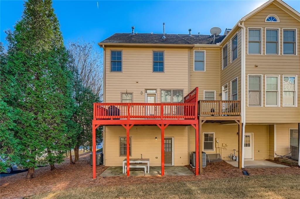 6414 Queens Court Trace, Unit 7 Mableton, GA 30126 - Photo 25 of 28 a view of a chairs with an umbrella