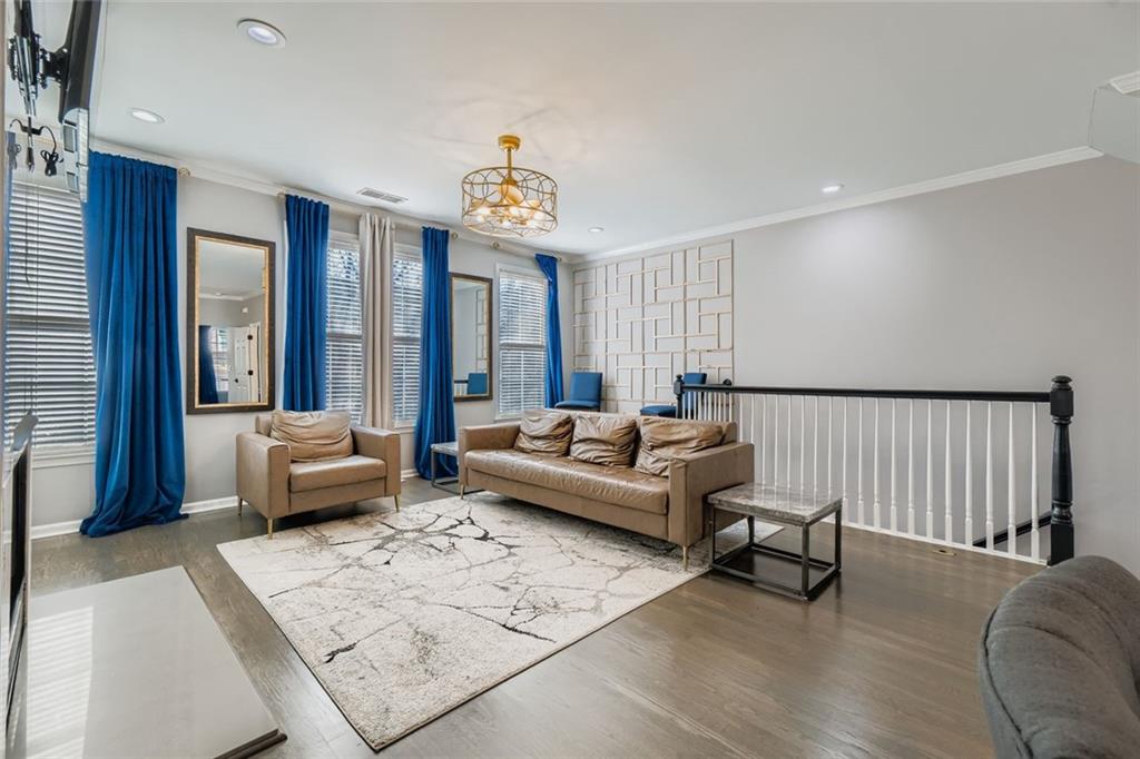 6414 Queens Court Trace, Unit 7 Mableton, GA 30126 - Photo 5 of 28 a living room with furniture and a large window