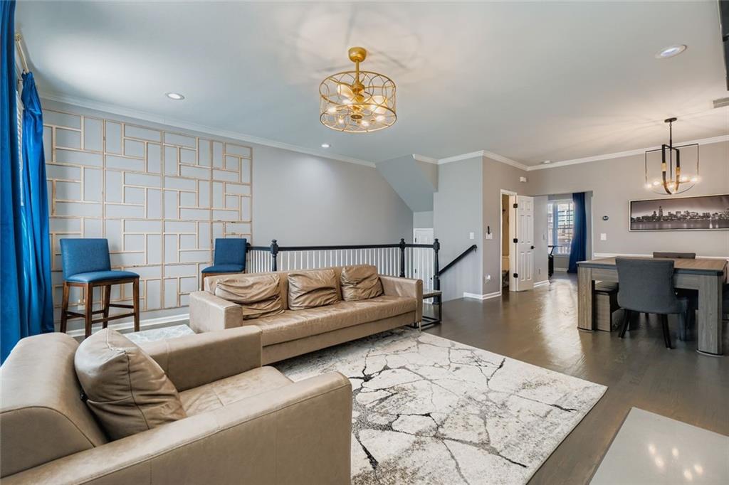 6414 Queens Court Trace, Unit 7 Mableton, GA 30126 - Photo 6 of 28 a living room with furniture and a rug