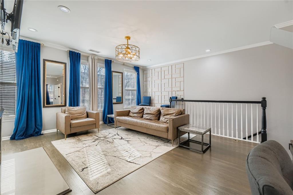 6414 Queens Court Trace, Unit 7 Mableton, GA 30126 - Photo 8 of 28 a living room with furniture and a large window