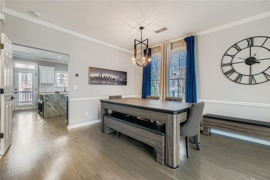 6414 Queens Court Trace, Unit 7 Mableton, GA 30126 - Photo 9 of 28 a living room with furniture and a wooden floor