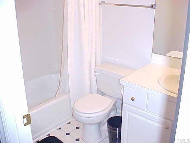 8251 Hempshire Place Raleigh, NC 27613 - Photo 7 of 10 HALL BATH UP
