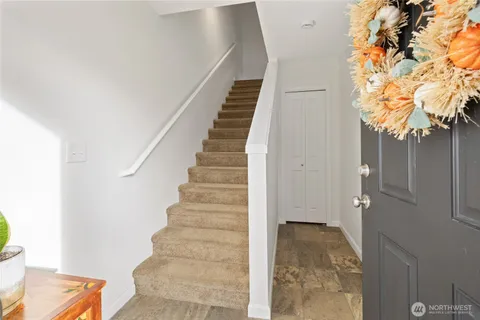 a view of an entryway with staircase