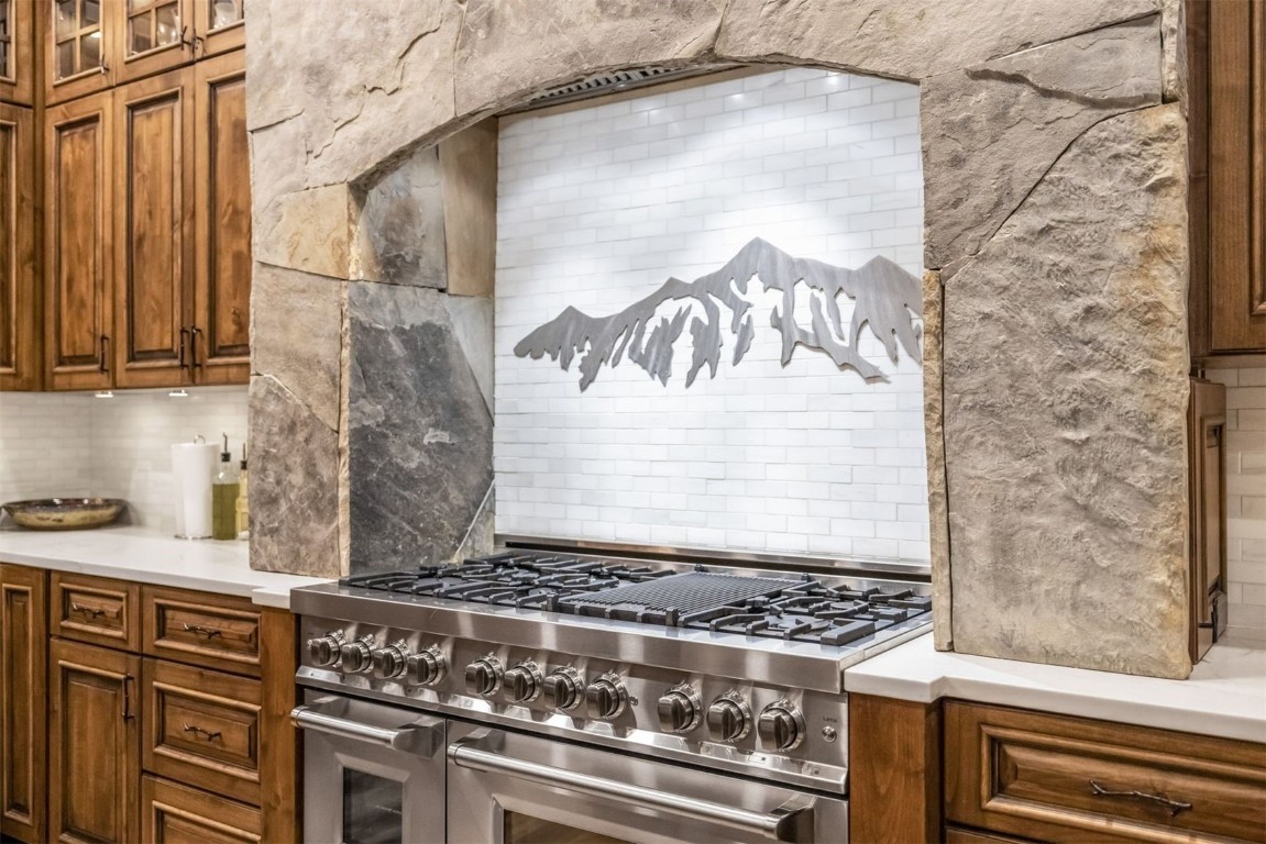 242 Point View Place Breckenridge, CO 80424 - Photo 11 of 47 a stove top oven sitting inside of a kitchen
