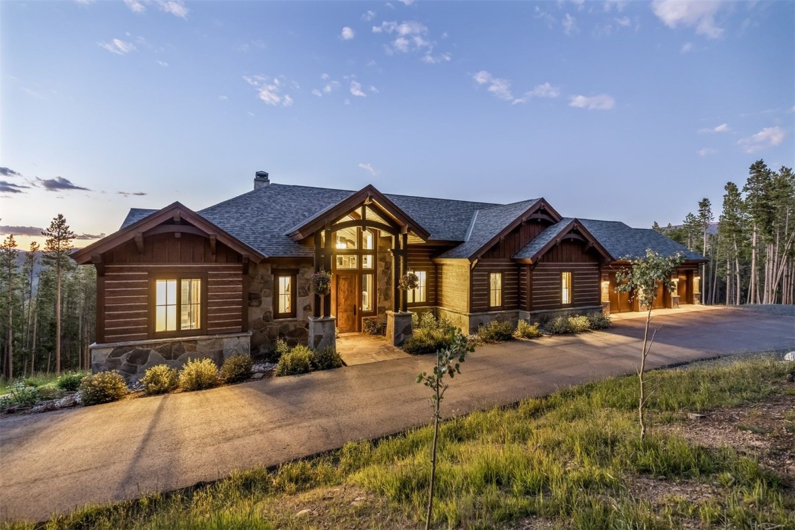 242 Point View Place Breckenridge, CO 80424 - Photo 2 of 47 a front view of a house with a yard and garage
