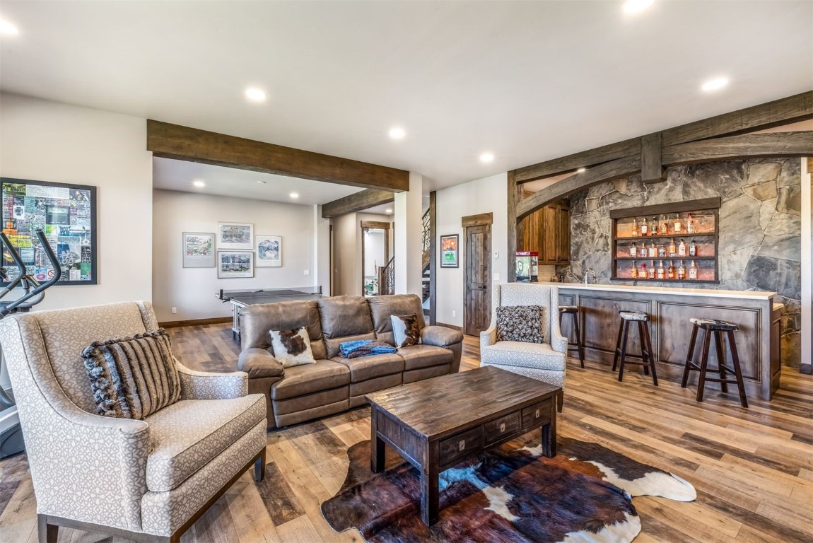 242 Point View Place Breckenridge, CO 80424 - Photo 23 of 47 a living room with furniture and a wooden floor