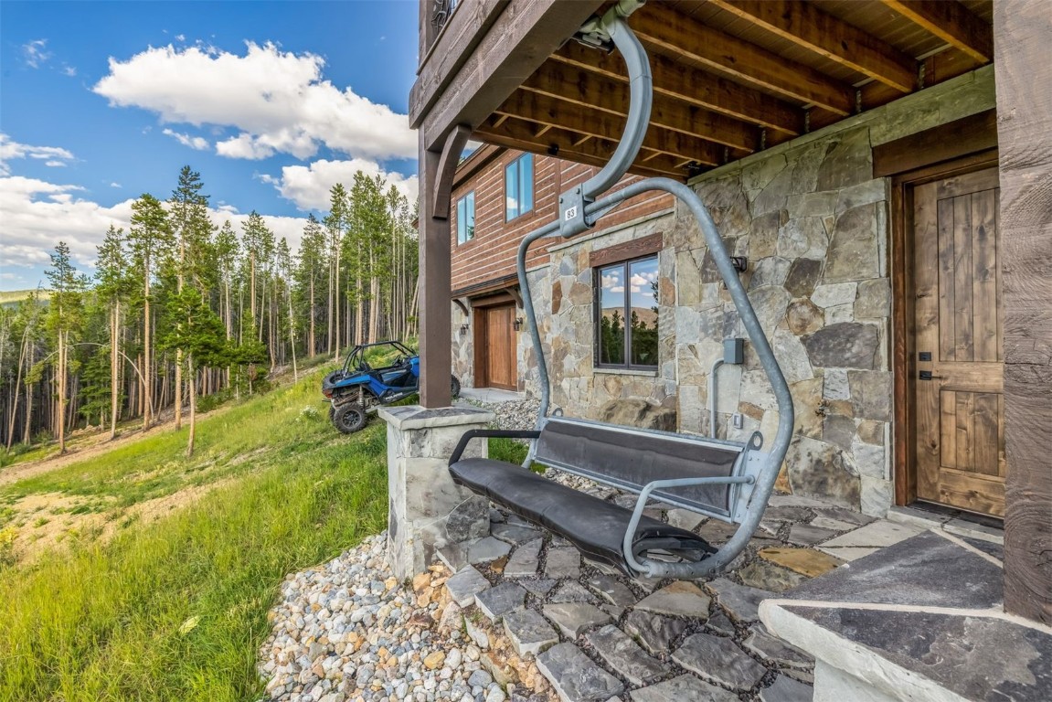 242 Point View Place Breckenridge, CO 80424 - Photo 35 of 47 a view of an chairs and table in patio with wooden fence