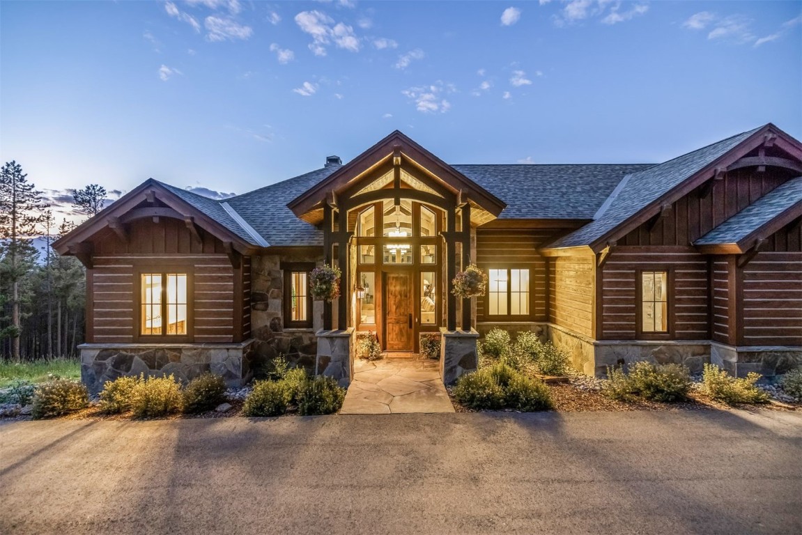 242 Point View Place Breckenridge, CO 80424 - Photo 42 of 47 a view of a house with large windows and a yard