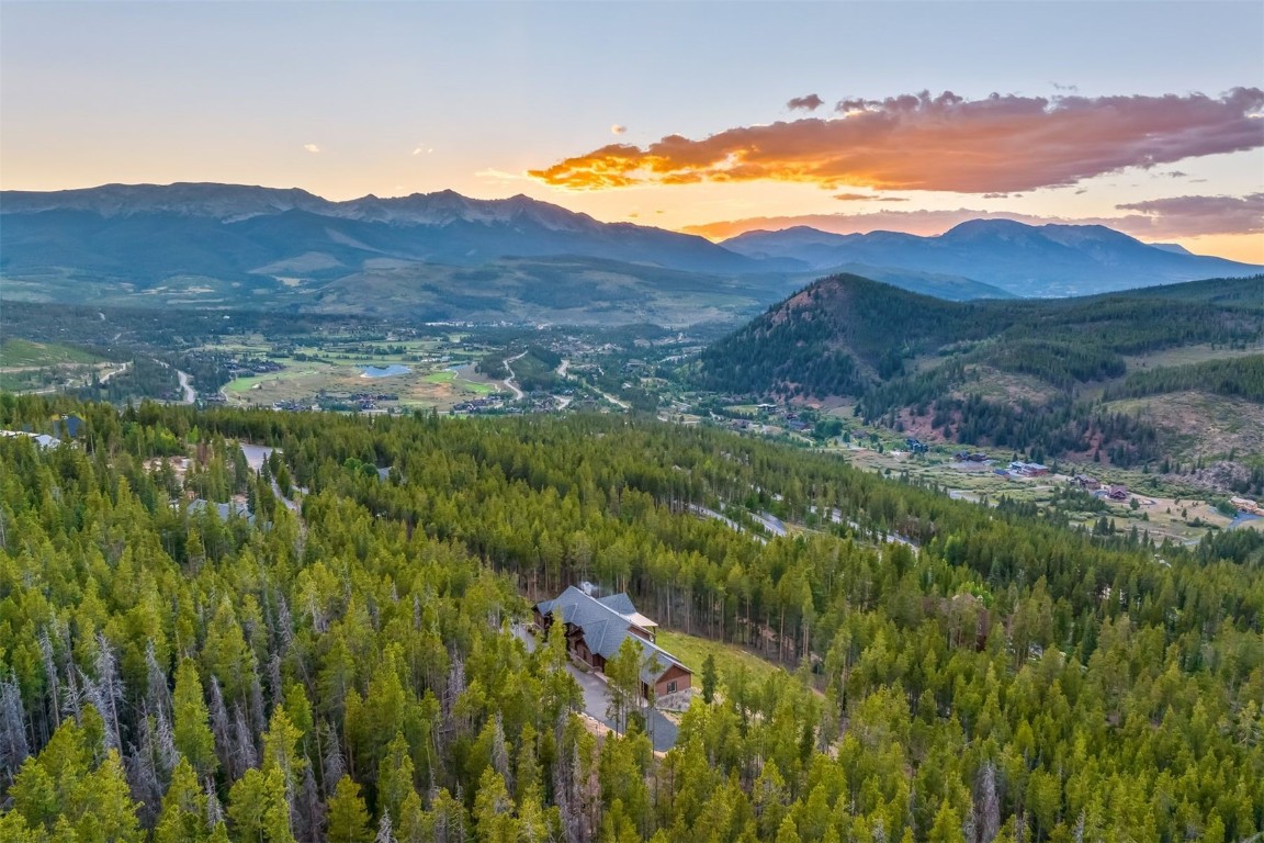 242 Point View Place Breckenridge, CO 80424 - Photo 44 of 47 a view of a lush green hillside and a houses