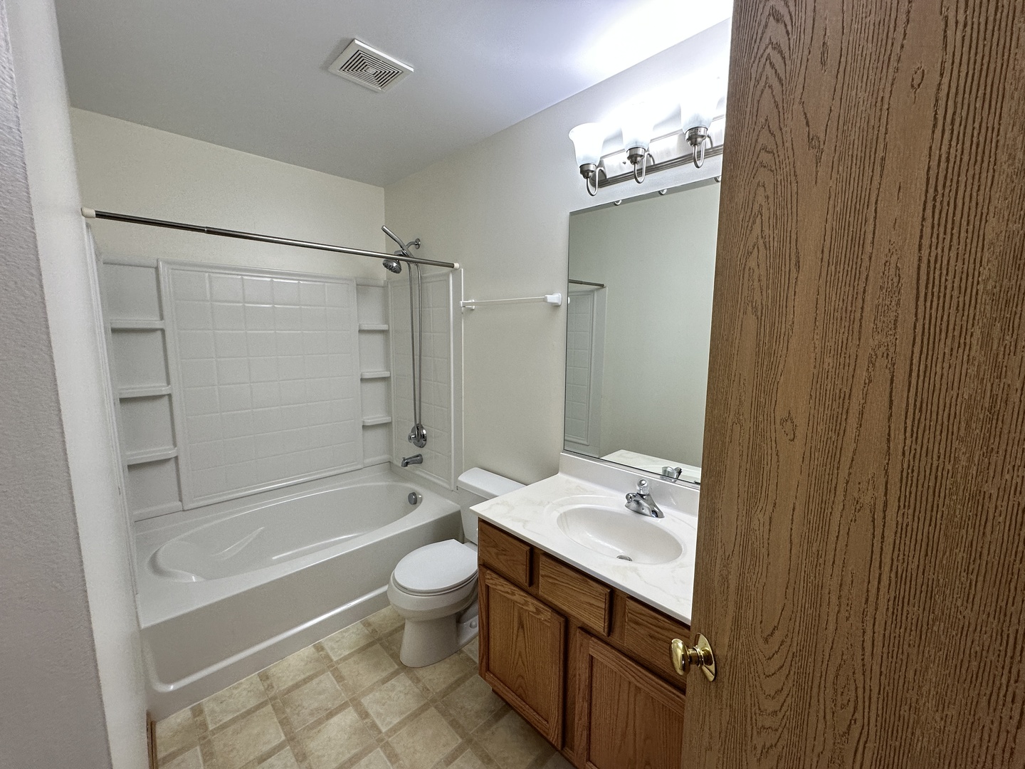 896 Emerald Drive Pingree Grove, IL 60140 - Photo 14 of 19 a bathroom with a sink a toilet and shower