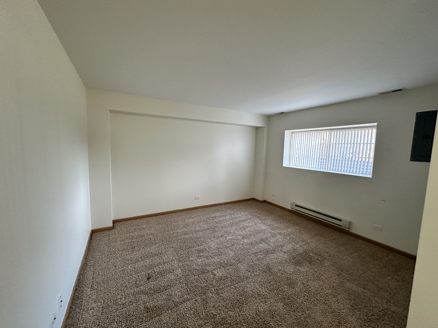 896 Emerald Drive Pingree Grove, IL 60140 - Photo 19 of 19 an empty room with windows