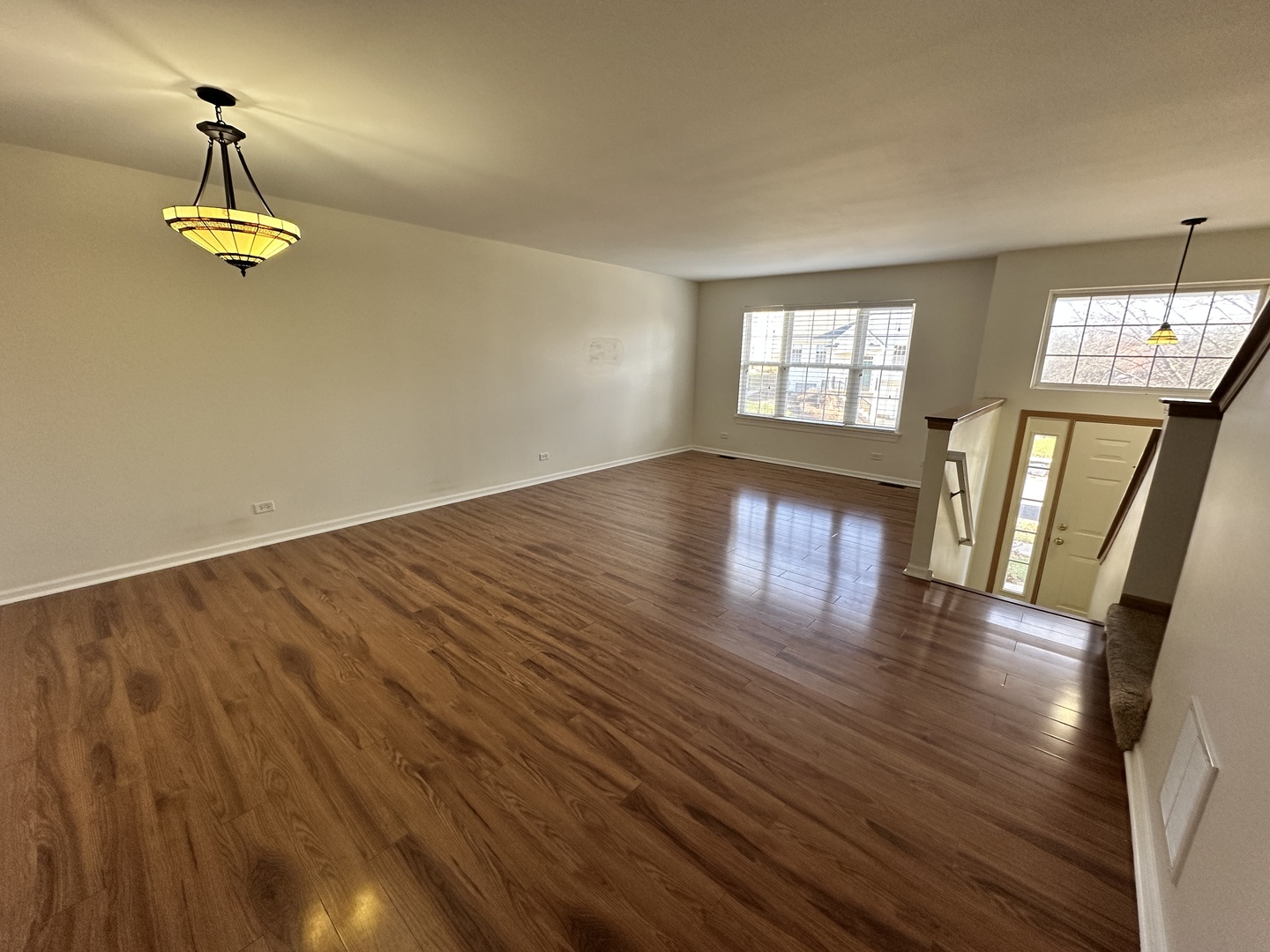 896 Emerald Drive Pingree Grove, IL 60140 - Photo 3 of 19 a view of empty room with wooden floor