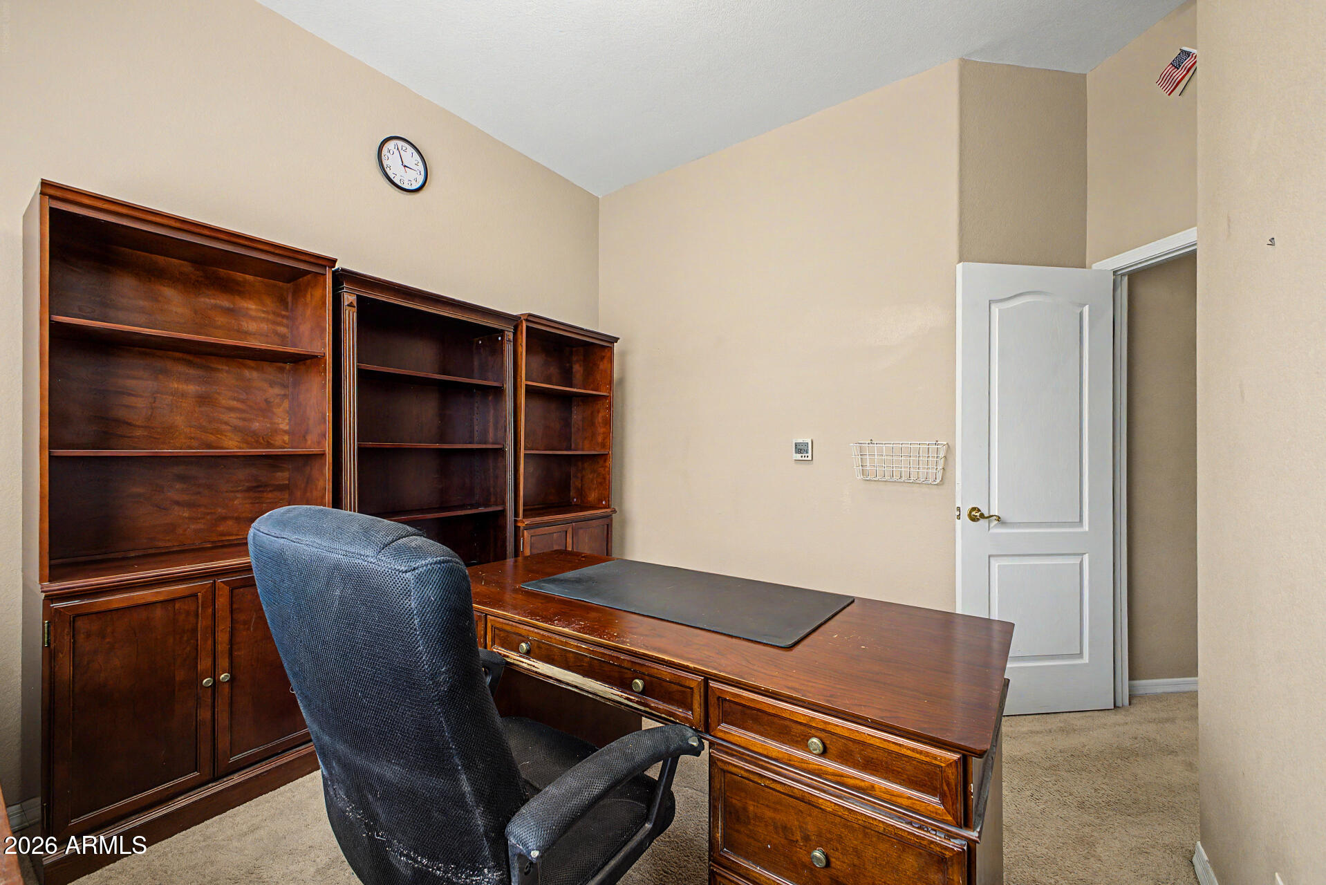 4394 South Strong Box Road Gold Canyon, AZ 85118 - Photo 24 of 33 a room with a chair and a potted plant