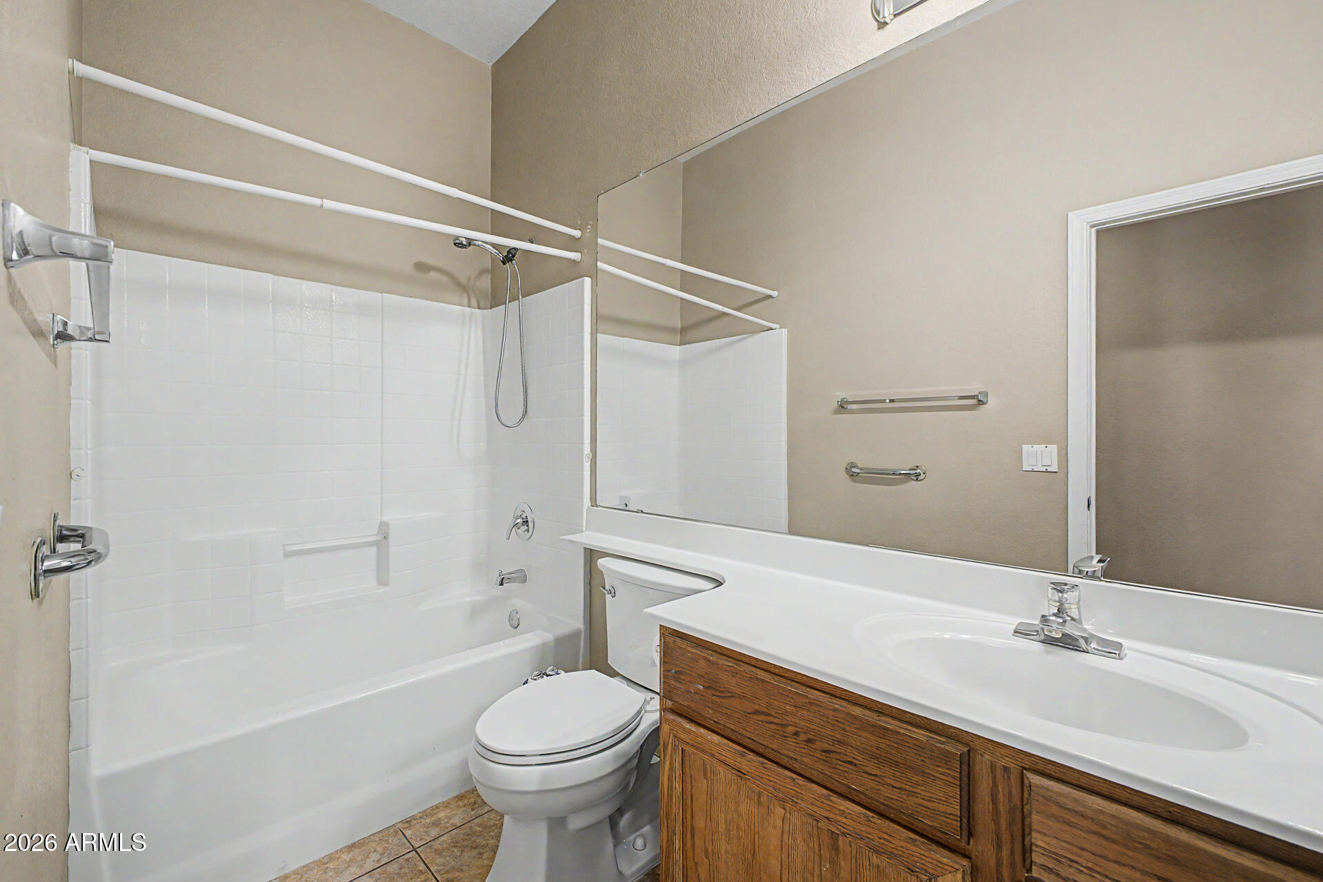4394 South Strong Box Road Gold Canyon, AZ 85118 - Photo 27 of 33 a bathroom with a sink a toilet and shower