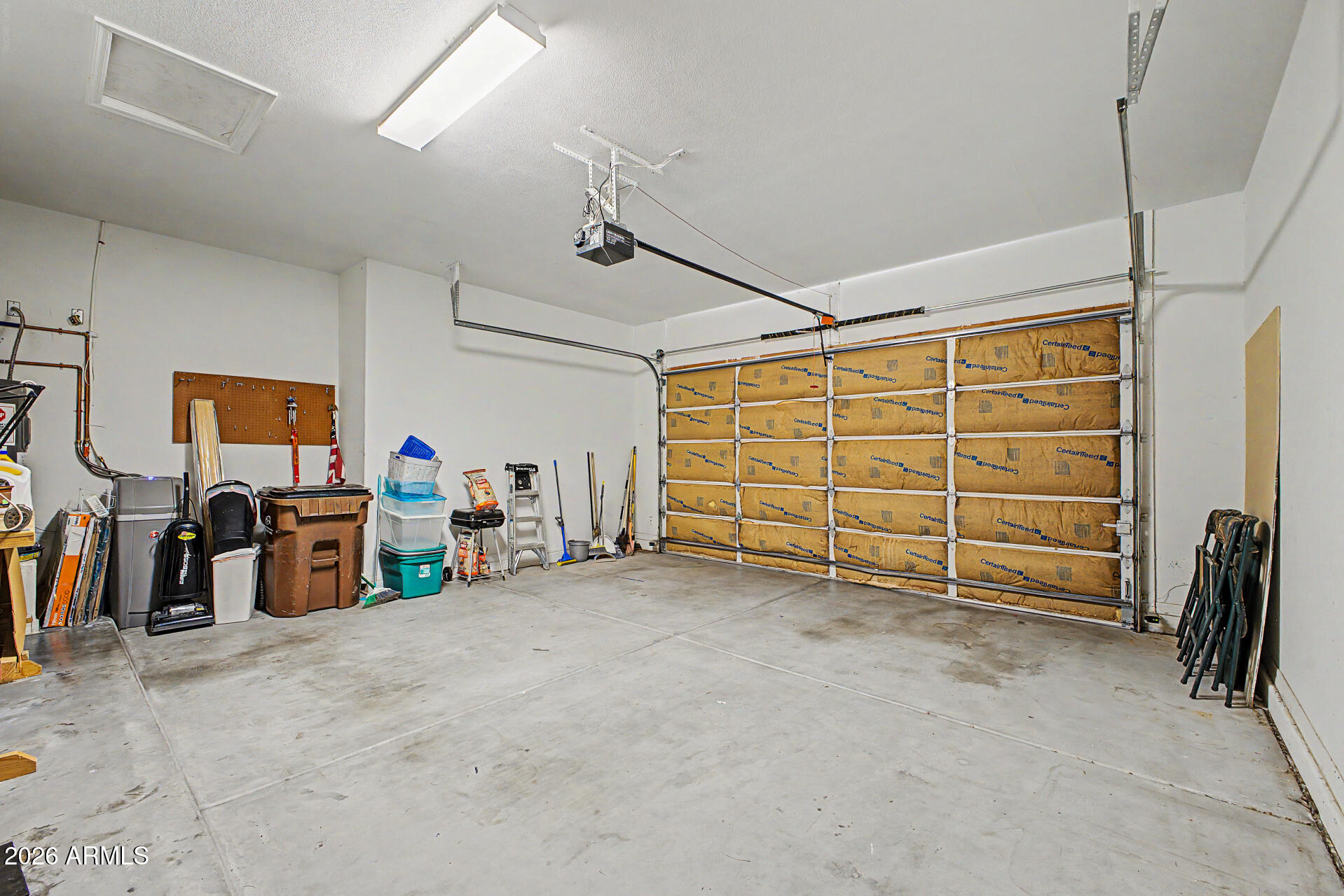 4394 South Strong Box Road Gold Canyon, AZ 85118 - Photo 29 of 33 a view of a garage with storage