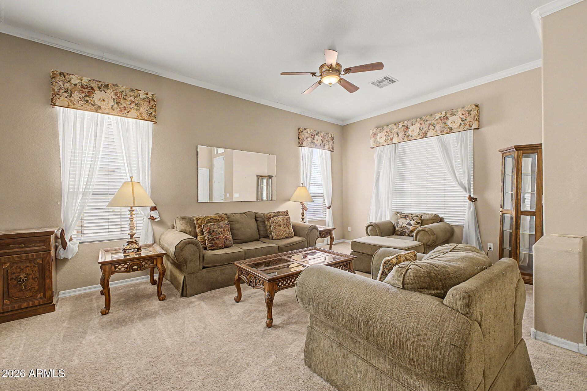 4394 South Strong Box Road Gold Canyon, AZ 85118 - Photo 6 of 33 a living room with furniture and a chandelier