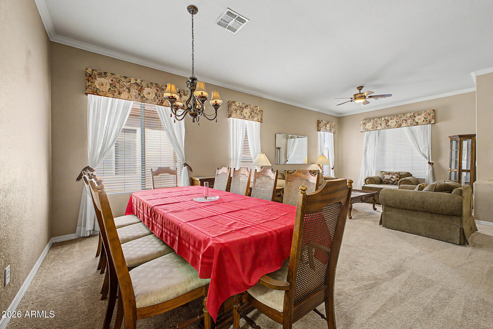 4394 South Strong Box Road Gold Canyon, AZ 85118 - Photo 9 of 33 a dining room with furniture and window