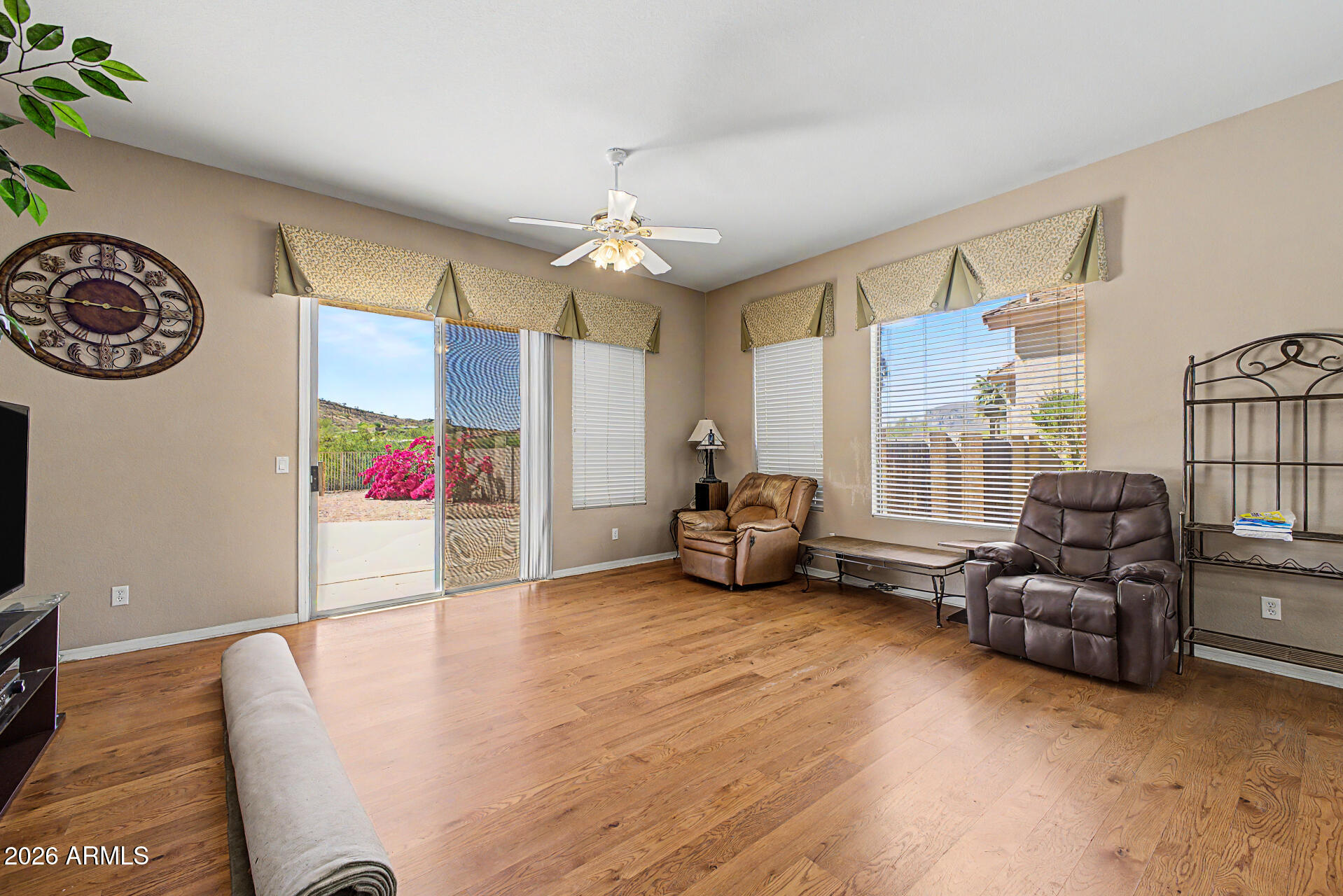 4394 South Strong Box Road Gold Canyon, AZ 85118 - Photo 10 of 33 a living room with furniture and a large window