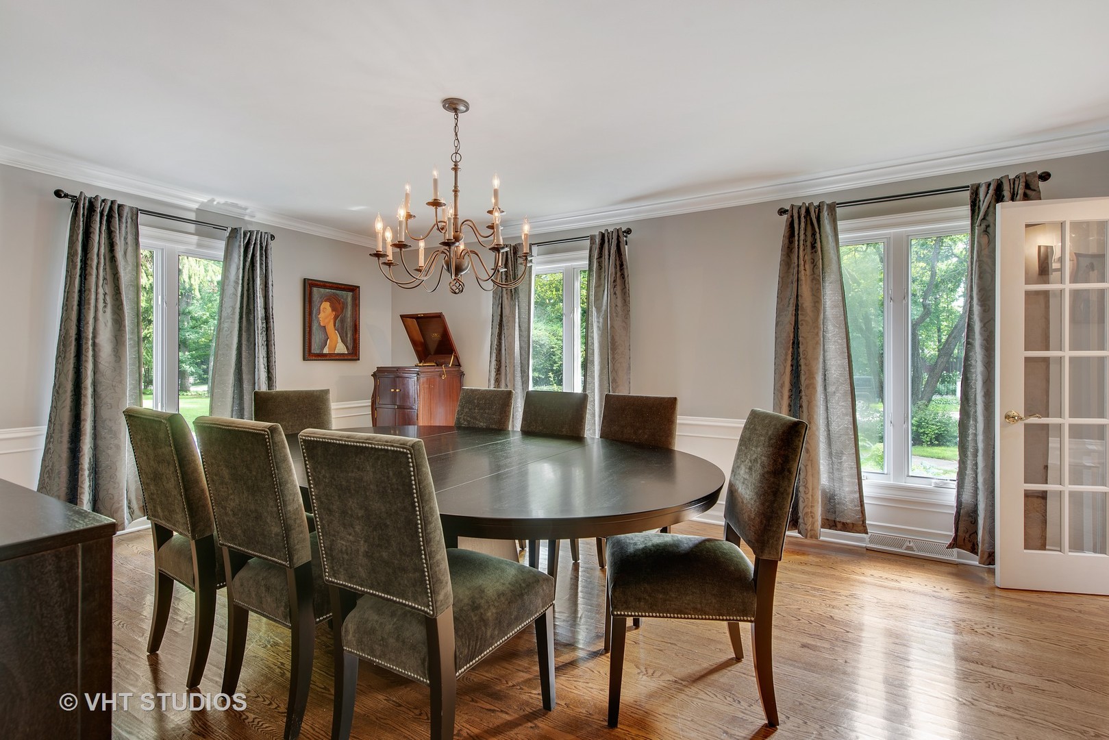 235 Maple Hill Road Glencoe, IL 60022 - Photo 12 of 35 a view of a dining room with furniture wooden floor and chandelier