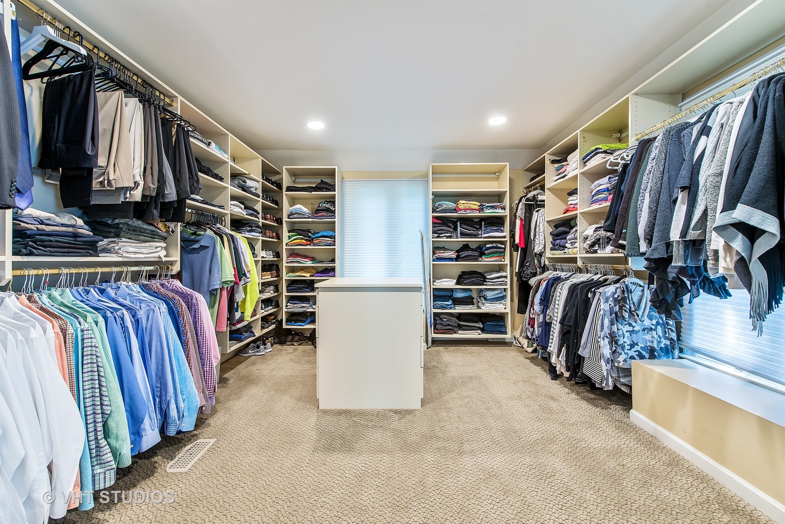 235 Maple Hill Road Glencoe, IL 60022 - Photo 18 of 35 a view of walk in closet with clothes and shoes