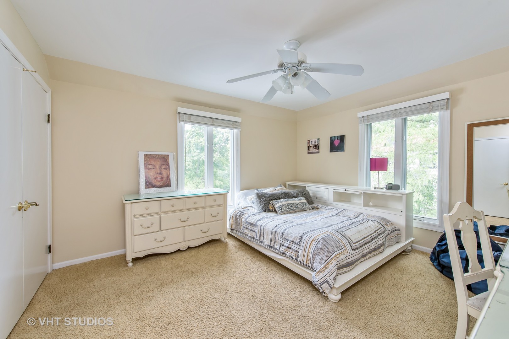 235 Maple Hill Road Glencoe, IL 60022 - Photo 19 of 35 a bedroom with a bed dresser and a window
