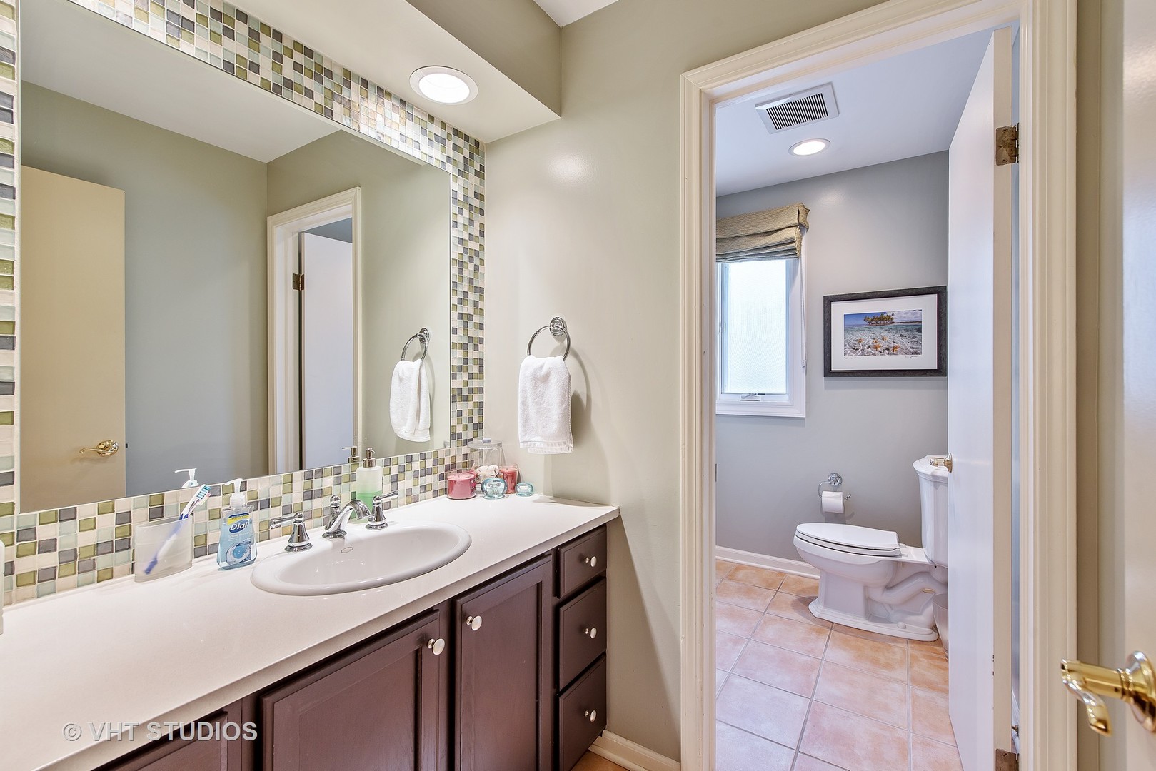 235 Maple Hill Road Glencoe, IL 60022 - Photo 20 of 35 a bathroom with a sink vanity and a toilet